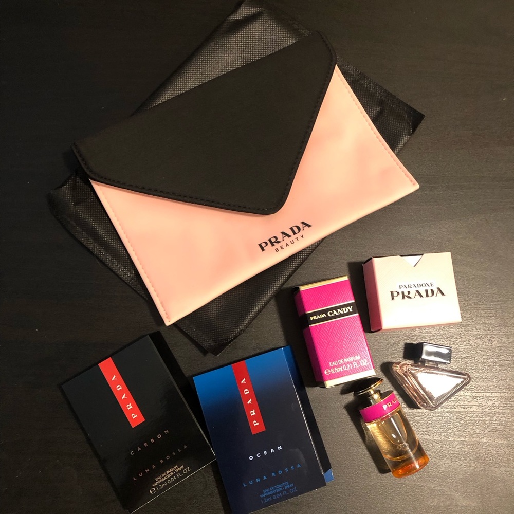 Prada mini perfumes set+cosmetic bag. Price firm